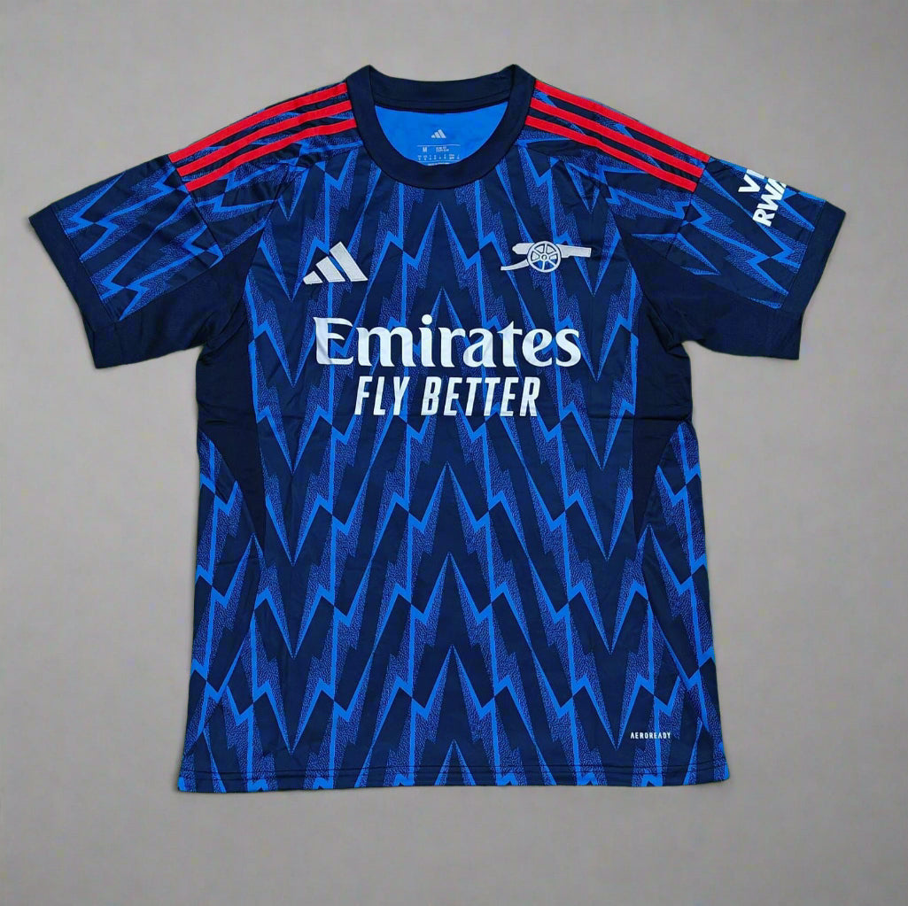 Blue sports jersey with Adidas and Emirates branding on a gray background